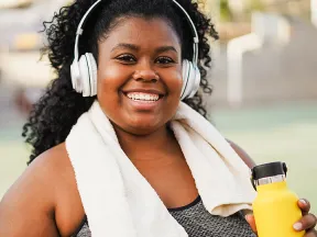 Smiling African American woman in workout gear